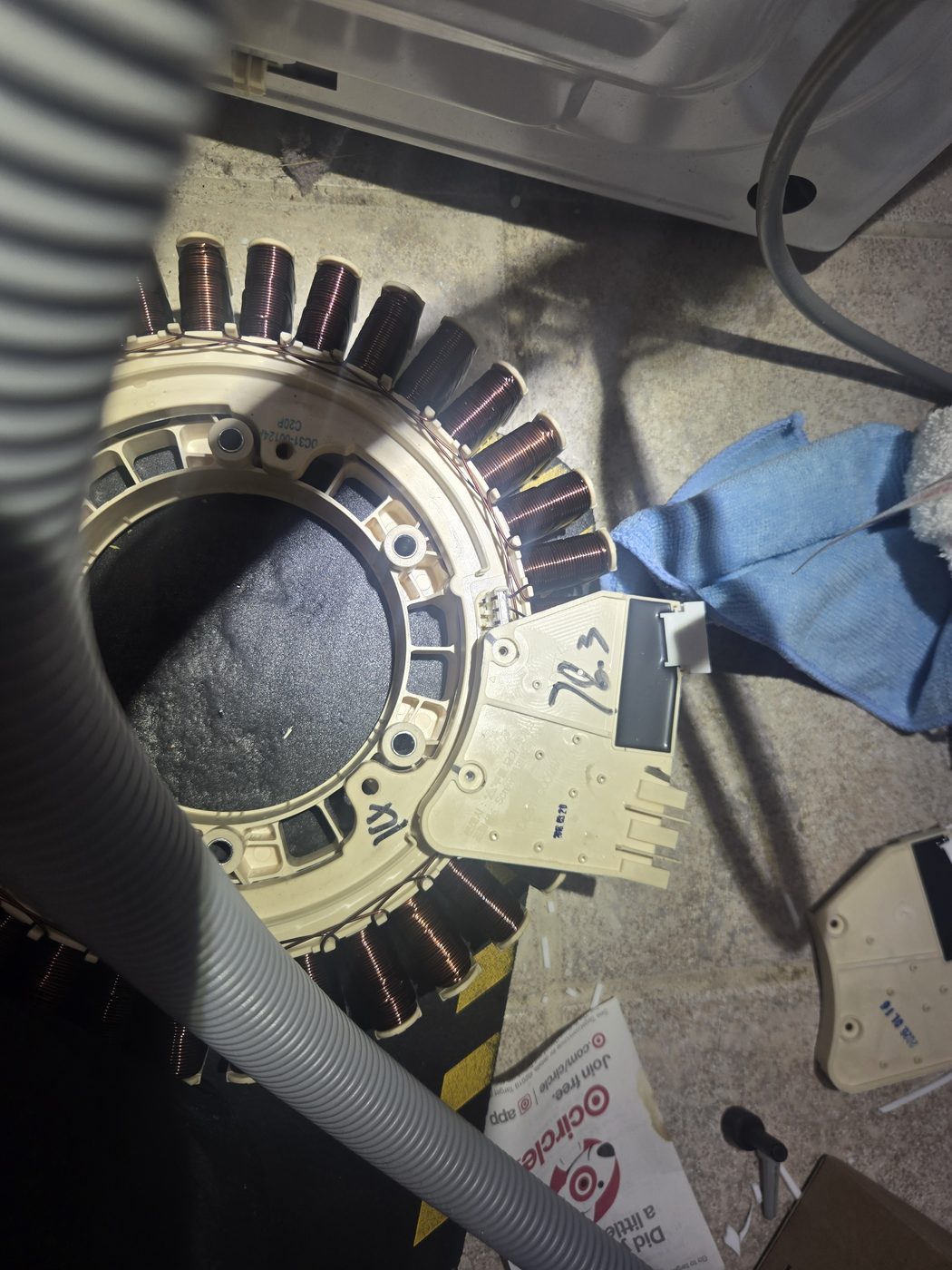 Washer drum and stator assembly removed during a teardown