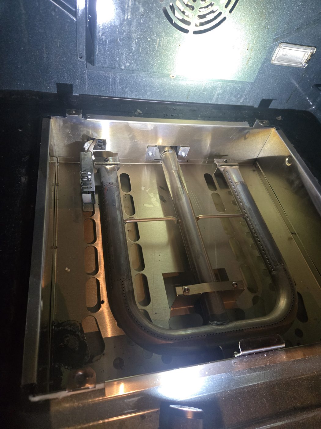 Oven and range internals exposed during a repair
